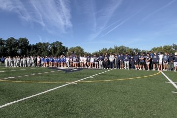 Mercy University students, faculty and staff gather at Mercy Field in the Westchester Campus to remember the attacks on September 11, 2001.