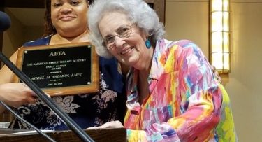 Two women at awards ceremony