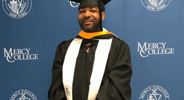 Jason skeeter in graduation cap and gown