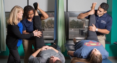 Professor Kathy Ryans and physical therapy students