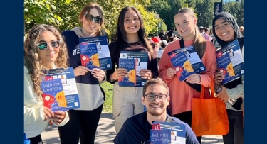 Students holding NEA Big Read book