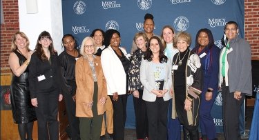 Photo of conference committee with keynote speaker