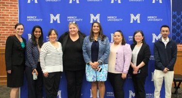 Mercy University faculty and participants of the Education Symposium