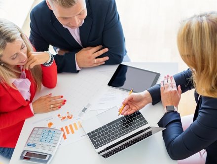 A Certified Public Accountant working with her clients.