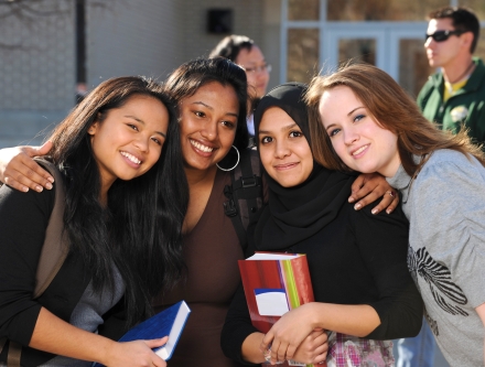 Group of smiling Mercy students