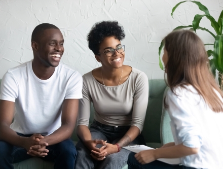 Young married couple receiving counseling.