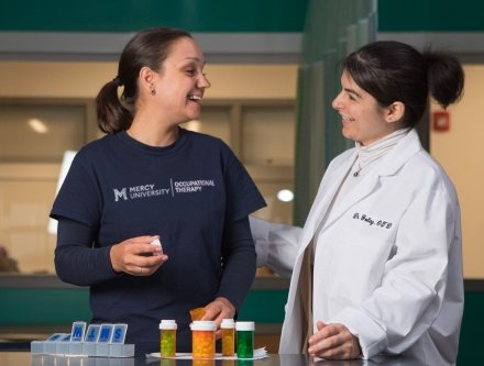 Occupational Therapy students learning in lab