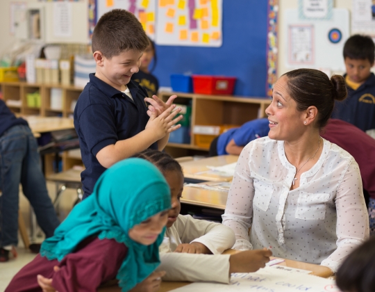 Teacher with students