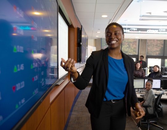 Business student presenting in the classroom