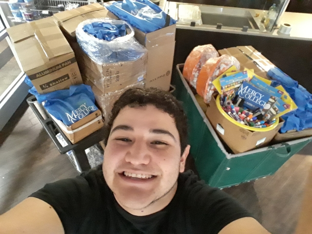 Student selfie with backpack materials